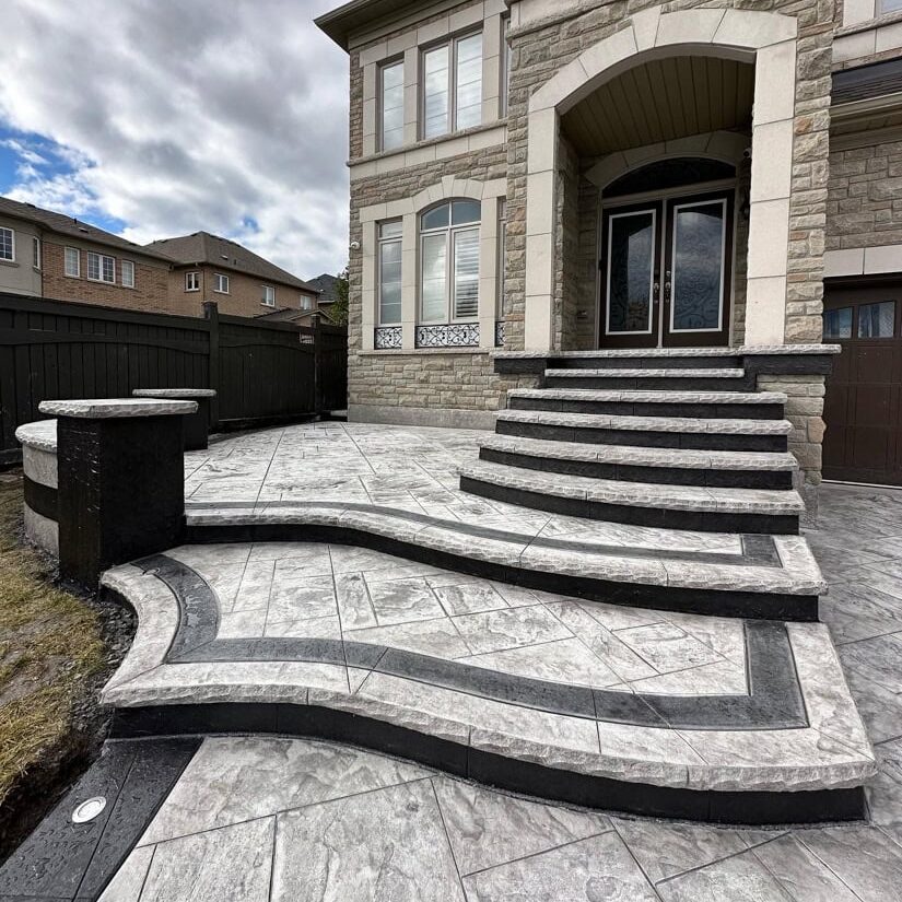 New stamped concrete steps and walkway installation at residential property in St. Charles IL by Arellano Landscaping
